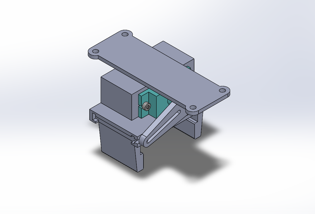Image of gripper assembly, a custom-made claw to pick up a one inch by one inch by one inch cube